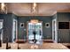 Dining area features a glass table, modern chairs, and a view of the outside at 649 46Th Avenue Ne Dr, Hickory, NC 28601