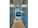 Hallway view of the main bedroom with a large bed, ceiling fan, and walk-in closet at 649 46Th Avenue Ne Dr, Hickory, NC 28601