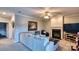 Living room featuring a fireplace, ceiling fan and neutral walls at 649 46Th Avenue Ne Dr, Hickory, NC 28601