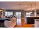 Open-concept living room and kitchen area with modern finishes and plenty of natural light at 649 46Th Avenue Ne Dr, Hickory, NC 28601