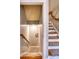 Staircase featuring carpeted stairs and wooden railing at 649 46Th Avenue Ne Dr, Hickory, NC 28601