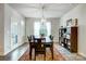 Formal dining room with table, chairs, and natural light at 6858 Hunts Mesa Dr, Fort Mill, SC 29707