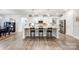 Bright, modern kitchen with a large island, stainless steel appliances, and stylish barstool seating at 6858 Hunts Mesa Dr, Fort Mill, SC 29707