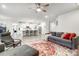 Bright and airy living space with a modern open floor plan, leading to a spacious kitchen and comfortable seating at 6858 Hunts Mesa Dr, Fort Mill, SC 29707