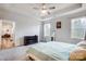Comfortable main bedroom boasts natural light, soft carpet, and seamless access to adjacent areas of the home at 6858 Hunts Mesa Dr, Fort Mill, SC 29707