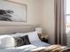Cozy bedroom with soft lighting, neutral tones, and a comfortable bed at 7003 Impulse Ct, Charlotte, NC 28205