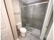 Modern bathroom showcasing glass-enclosed shower, updated fixtures, and neutral tiling at 8069 Cedar Glen Dr, Charlotte, NC 28212