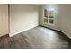 Bedroom offers a cozy retreat with hardwood floors, closet, and lots of natural light at 8069 Cedar Glen Dr, Charlotte, NC 28212
