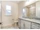 Bright bathroom features modern vanity with granite countertop, toilet, and tiled shower/tub combo at 8716 Acadia Pkwy # 596, Sherrills Ford, NC 28673