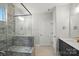 Bathroom featuring a glass enclosed shower, a gray tiled bench and a gray vanity with white countertop at 8716 Acadia Pkwy # 596, Sherrills Ford, NC 28673