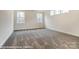 Bedroom with plush carpeting, neutral paint colors, and double windows for ample natural light at 8716 Acadia Pkwy # 596, Sherrills Ford, NC 28673