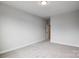 Spacious carpeted bedroom bathed in natural light, ready for your personal touch at 8716 Acadia Pkwy # 596, Sherrills Ford, NC 28673