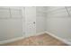 Walk-in closet with neutral carpet and white wire shelving for maximum storage at 8716 Acadia Pkwy # 596, Sherrills Ford, NC 28673