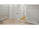 Spacious walk-in closet with wire shelving and views to the hallway at 8716 Acadia Pkwy # 596, Sherrills Ford, NC 28673