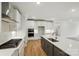 Open kitchen featuring stainless appliances, a large island, and tile backsplash at 8716 Acadia Pkwy # 596, Sherrills Ford, NC 28673