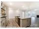 Open kitchen area with a large island, stainless steel sink, and views into the living space at 8716 Acadia Pkwy # 596, Sherrills Ford, NC 28673