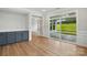 Open living space with modern built-ins, access to the outdoors and wood flooring at 8716 Acadia Pkwy # 596, Sherrills Ford, NC 28673