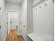 Mudroom with a built-in bench, coat hooks, and access to the laundry room at 8716 Acadia Pkwy # 596, Sherrills Ford, NC 28673