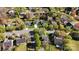 Aerial view of a neighborhood showing houses with green lawns and tree-lined streets at 9108 Clifton Meadow Dr, Matthews, NC 28105