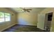 Comfortable bedroom featuring a ceiling fan, a window with natural light, and wood-look flooring at 1024 Old Mountain View Rd, Mount Holly, NC 28120
