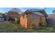 Brick house with well maintained yard and bushes at 1024 Old Mountain View Rd, Mount Holly, NC 28120