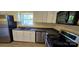 Kitchen featuring stainless appliances and light cabinets, complemented by a modern countertop at 1024 Old Mountain View Rd, Mount Holly, NC 28120