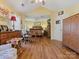 Spacious bedroom with wood floors, offering room to spread out and relax at 10700 Summitt Tree Ct, Charlotte, NC 28277