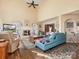 Bright, airy living room features vaulted ceilings, a cozy fireplace, and stylish furnishings at 10700 Summitt Tree Ct, Charlotte, NC 28277