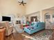 Bright, airy living room features vaulted ceilings, a cozy fireplace, and stylish furnishings at 10700 Summitt Tree Ct, Charlotte, NC 28277