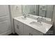 Modern bathroom with a double sink vanity, framed mirror, and walk in shower at 1105 Harry Ct, Albemarle, NC 28001