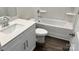 Clean bathroom featuring a white vanity with quartz countertop, toilet, and bathtub at 1105 Harry Ct, Albemarle, NC 28001