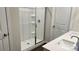 Bathroom featuring a walk-in shower with glass door and double sink vanity at 1105 Harry Ct, Albemarle, NC 28001