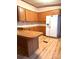 The kitchen has wood cabinets and an island at 13080 Philadelphia Church Rd, Oakboro, NC 28129