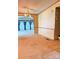 Open-concept living area featuring a chandelier and archway at 13080 Philadelphia Church Rd, Oakboro, NC 28129
