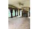 Spacious living room featuring a cozy fireplace and large windows at 13080 Philadelphia Church Rd, Oakboro, NC 28129