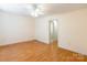 Bright bedroom with hardwood floors, a ceiling fan and neutral paint at 1461 Flintwood Dr, Rock Hill, SC 29732