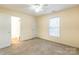 Bedroom featuring a ceiling fan, ensuite bathroom, and closet at 1461 Flintwood Dr, Rock Hill, SC 29732