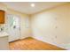 Eat-in kitchen with a back door, wood floors and neutral paint at 1461 Flintwood Dr, Rock Hill, SC 29732