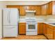 Spacious kitchen featuring a new refrigerator, range, and light wood cabinets at 1461 Flintwood Dr, Rock Hill, SC 29732