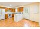 Well-equipped kitchen with a breakfast bar, matching appliances, and outside access at 1461 Flintwood Dr, Rock Hill, SC 29732
