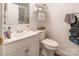 Bathroom featuring a white vanity and toilet with an open shelf at 1465 Flintwood Dr, Rock Hill, SC 29732