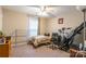 Bedroom featuring a ceiling fan, large window, and carpeted floors at 1465 Flintwood Dr, Rock Hill, SC 29732