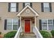 Close-up of the entryway with a red door and covered porch at 1465 Flintwood Dr, Rock Hill, SC 29732