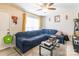 Living room featuring a cozy blue sectional sofa with natural light at 1465 Flintwood Dr, Rock Hill, SC 29732