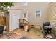 Back patio with outdoor grill, stairs to back door, and ample outdoor space at 1469 Flintwood Dr, Rock Hill, SC 29732