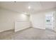Bright and versatile upstairs bonus room with soft carpet, perfect as flex space for the home at 1762 Braemar Village Dr, Monroe, NC 28110