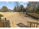 Spacious fenced backyard with new wood fence at 1828 Haines St, Charlotte, NC 28216