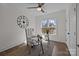 Well-lit office featuring a glass desk, patterned chair, and two windows at 1828 Haines St, Charlotte, NC 28216