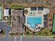 An aerial view showcasing the community pool, playground, tennis courts and other amenities at 1874 Larkspur Way, Tega Cay, SC 29708