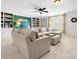 Bonus room with sectional sofa, built-in bookshelves and lots of natural light at 1874 Larkspur Way, Tega Cay, SC 29708